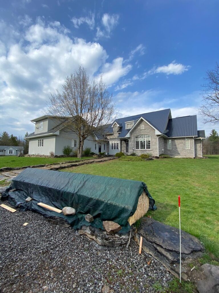 Custom backyard workshop with metal roof built by N.S. Custom Contracting