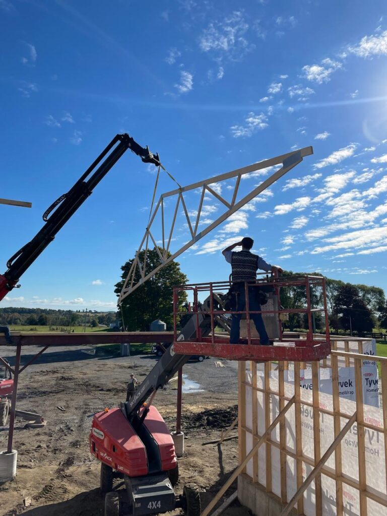 Wood framing stage of a custom detached garage build in Northumberland County