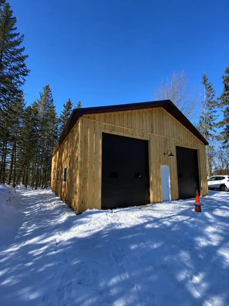 Completed single-bay garage with gravel driveway on a rural Ontario property