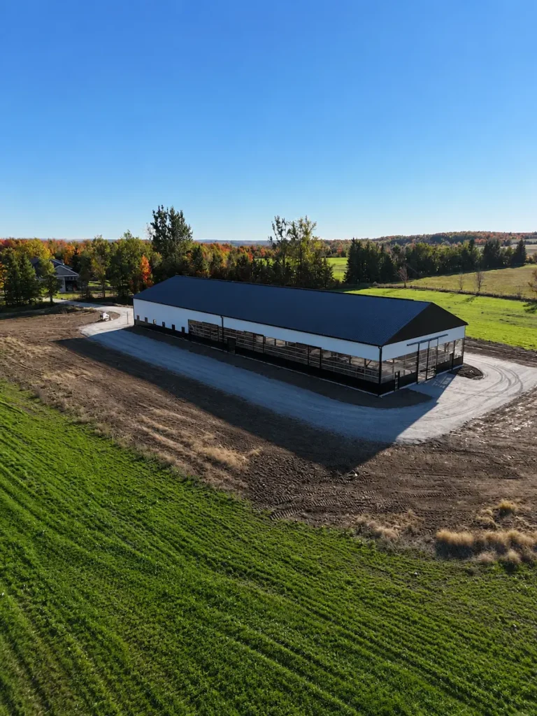 Large steel pole barn built for agricultural use on a farm in Northumberland County Ontario