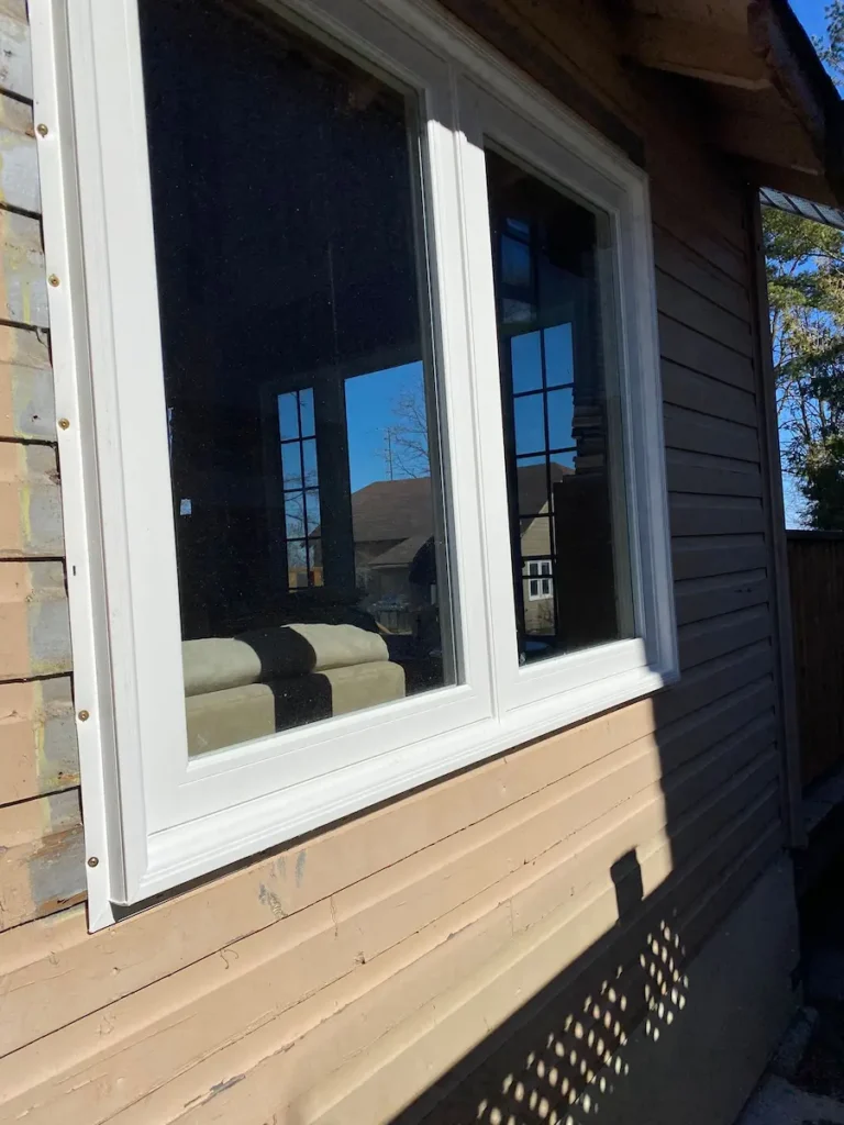 large double casement with fresh install edge detail visible