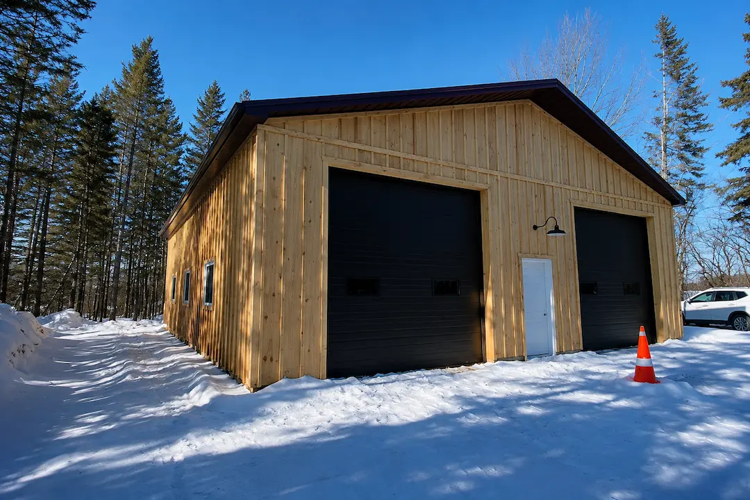 Post-frame building lifespan factors: post base, steel roof, engineered trusses