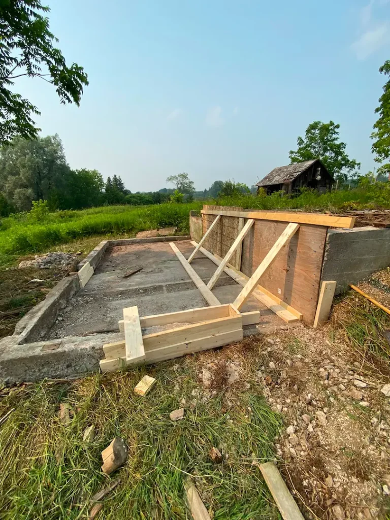 Wide view of the braced forms across the foundation